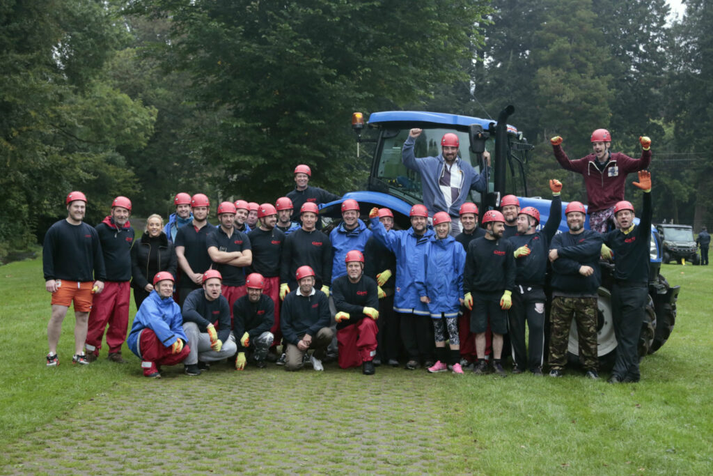 Team photo with tractor